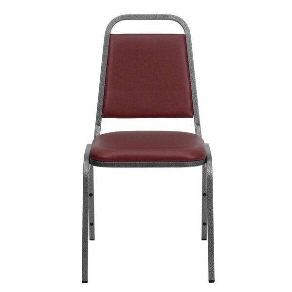 A burgundy Flash Furniture banquet chair with a metal frame and thick cushion.