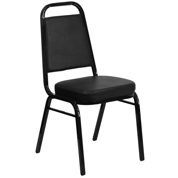 A Flash Furniture black banquet chair with black cushion.