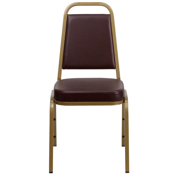 A brown banquet chair with a gold metal frame.