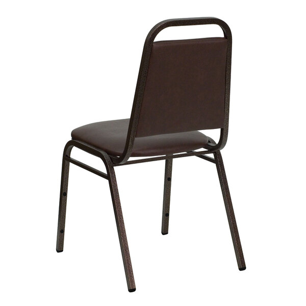 A Flash Furniture brown vinyl banquet chair with metal legs.