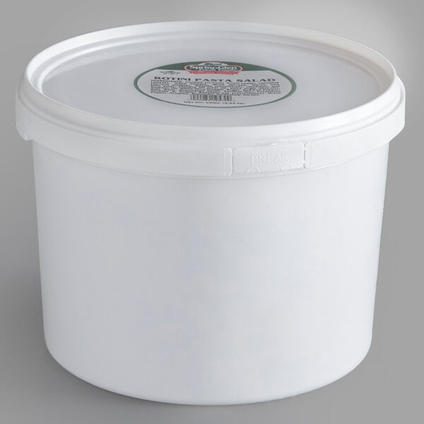 A white plastic container with a label on it containing Spring Glen Fresh Foods Rotini Pasta Salad.
