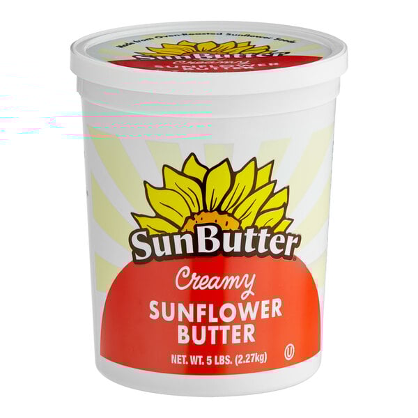 A white container of SunButter Creamy Sunflower Spread with a red and white label.
