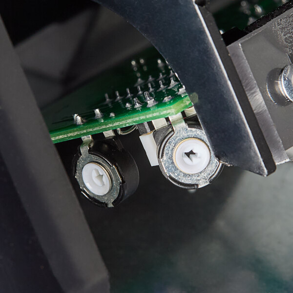 A close up of an American Dryer circuit board.