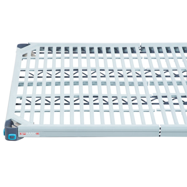 A white metal MetroMax Q shelf with blue handles.