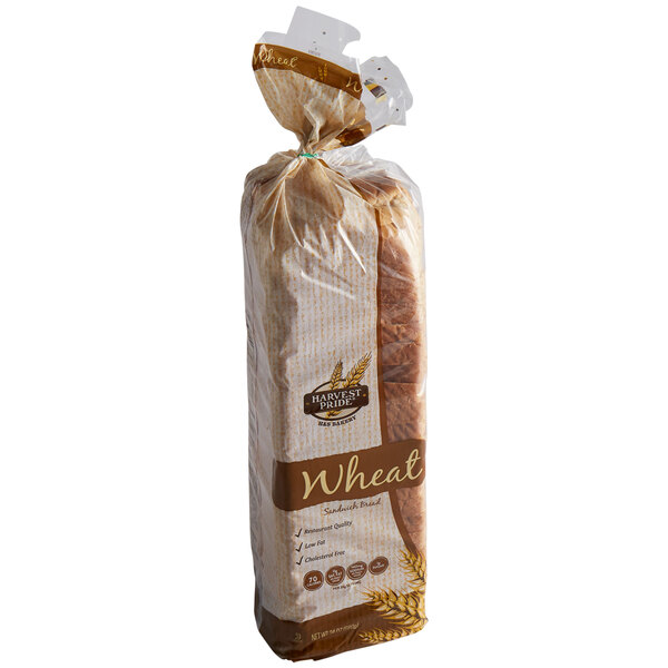 A plastic bag of Harvest Pride Baker Wheat Pullman bread loaves.