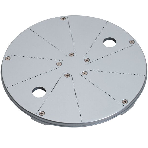 A Waring 1/64" pulping disc, a circular metal plate with holes in it.