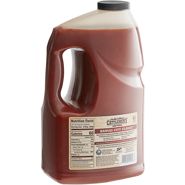 A gallon jug of Cattlemen's Kansas City Classic BBQ Sauce with a label.