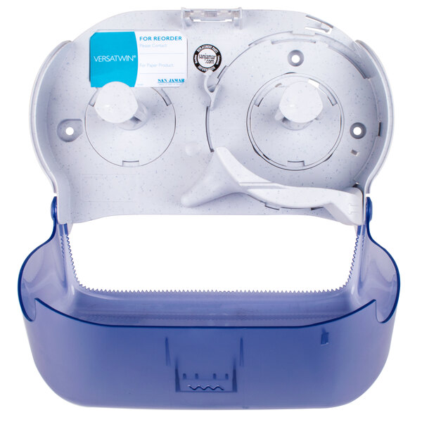 A white plastic San Jamar Versatwin toilet tissue dispenser with a blue lid.