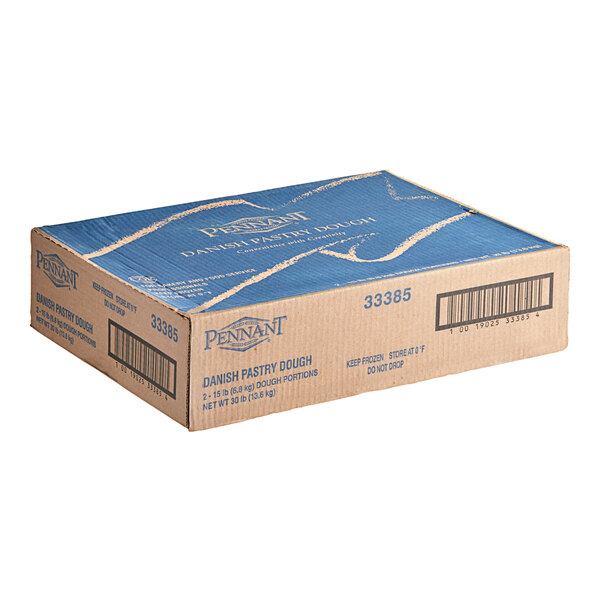A cardboard box labeled Pennant Danish Pastry Dough containing two 15 lb. bags.