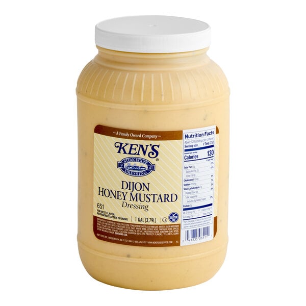A 1-gallon container of Ken's Dijon Honey Mustard Dressing.