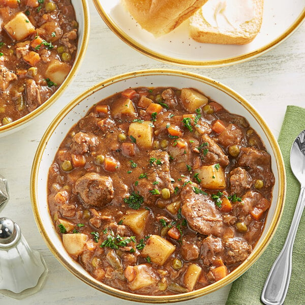 thick beef Irish stew in white bowl