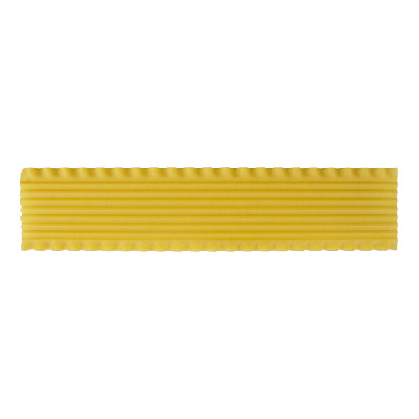A yellow strip of Regal long lasagna pasta with a wavy design.