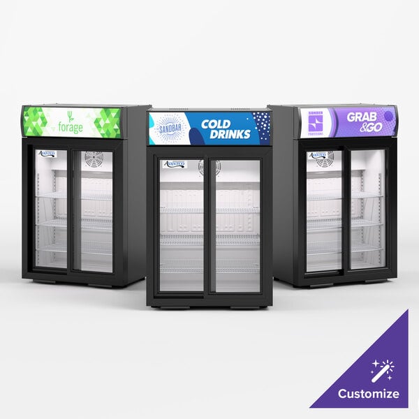 Three black countertop display refrigerators with glass sliding doors and customizable merchandising panels on top, shown empty against a white background.