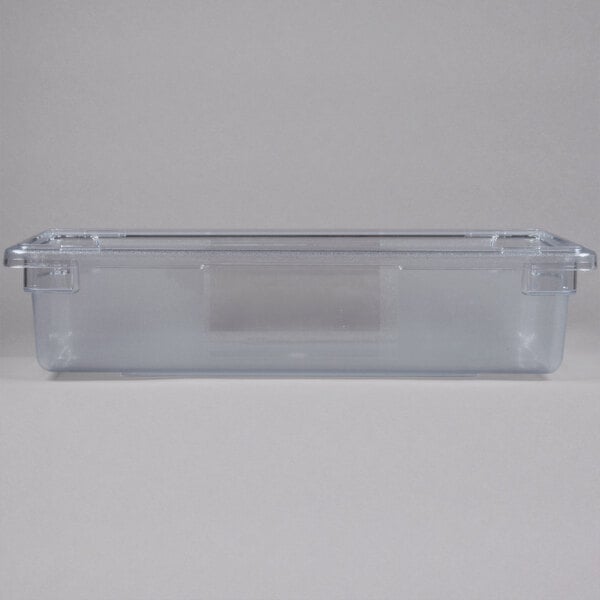 A Rubbermaid clear plastic food storage box with a lid.