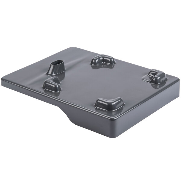 A black plastic tray with two holes in it.