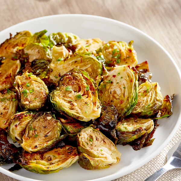 A plate of roasted Brussels sprouts.