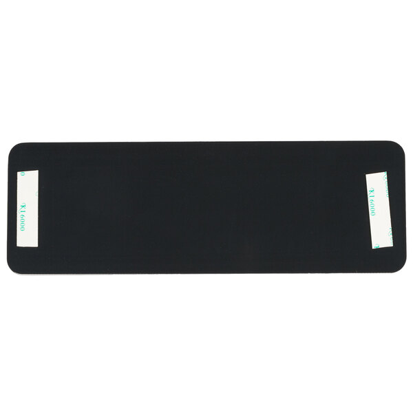 A black rectangular object with white labels reading "Caballeros" and "Men" above a white border.