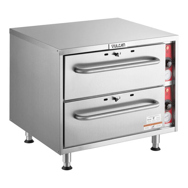 A stainless steel Vulcan freestanding two drawer warmer with control knobs on the right side.