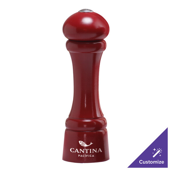A red salt and pepper shaker with white text that says "Windsor Autumn Hues"