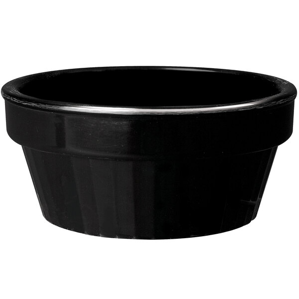 A black fluted melamine ramekin.