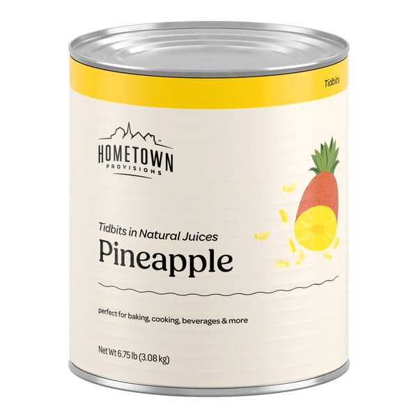 A large can with a yellow and white label featuring an illustration of a pineapple and pineapple tidbits, labeled as pineapple tidbits in natural juices.
