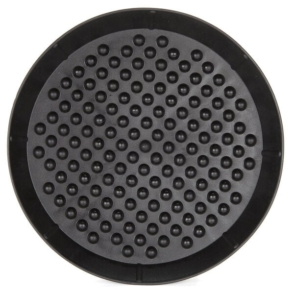 A black round pan with small holes.