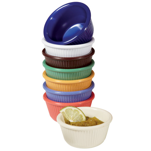 A stack of ivory fluted melamine ramekins.