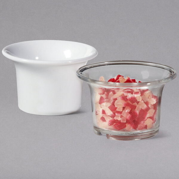 A white GET plastic ramekin with food in it.