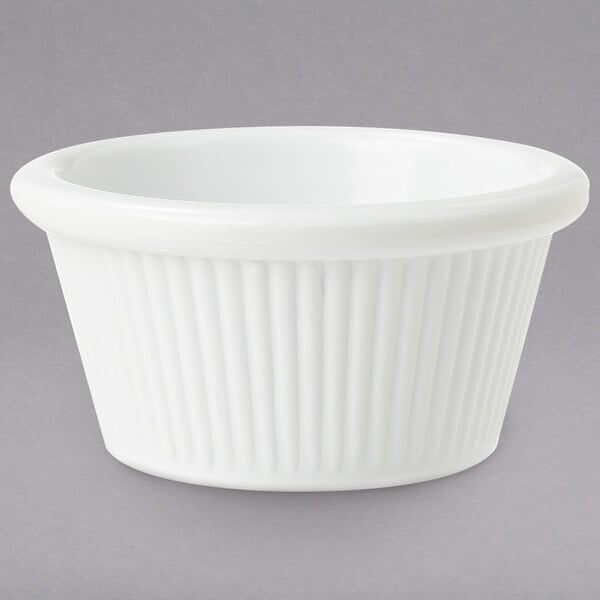 A white fluted melamine ramekin.