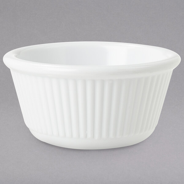 A white fluted melamine ramekin.