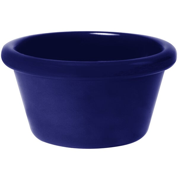 A close-up of a cobalt blue melamine ramekin.