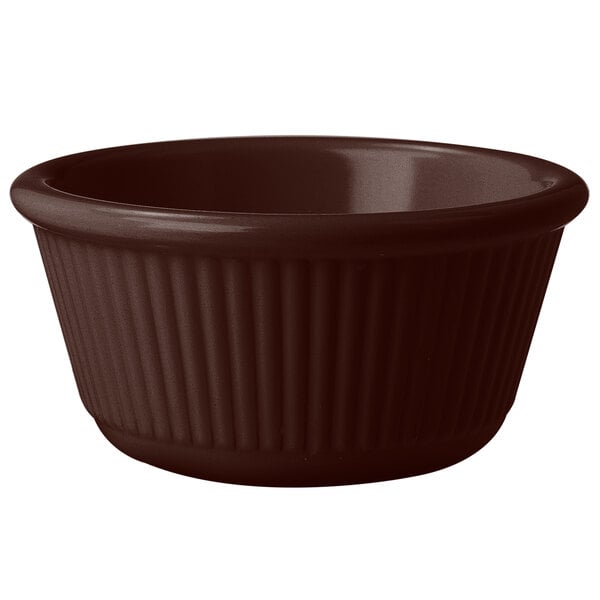 A brown fluted melamine ramekin.