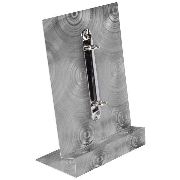 A Menu Solutions Alumitique aluminum table tent with a swirl finish on a metal stand.