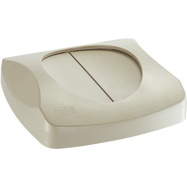 A beige rectangular Rubbermaid trash can with a round lid.