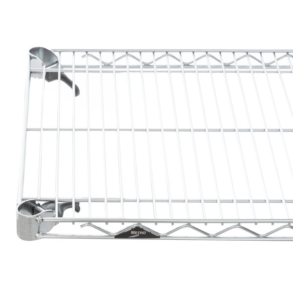 A Metro Super Erecta wire shelf with a handle.