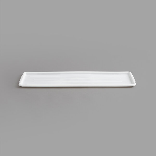 A white rectangular Channel plastic platter.