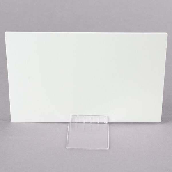 A white card with a clear plastic holder.