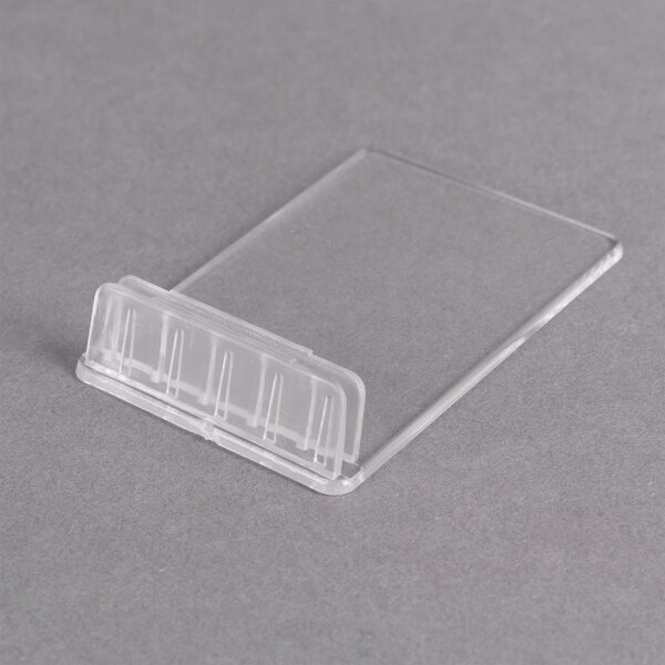 A clear plastic case with a white background holding white American Metalcraft Mini Chalk Cards.