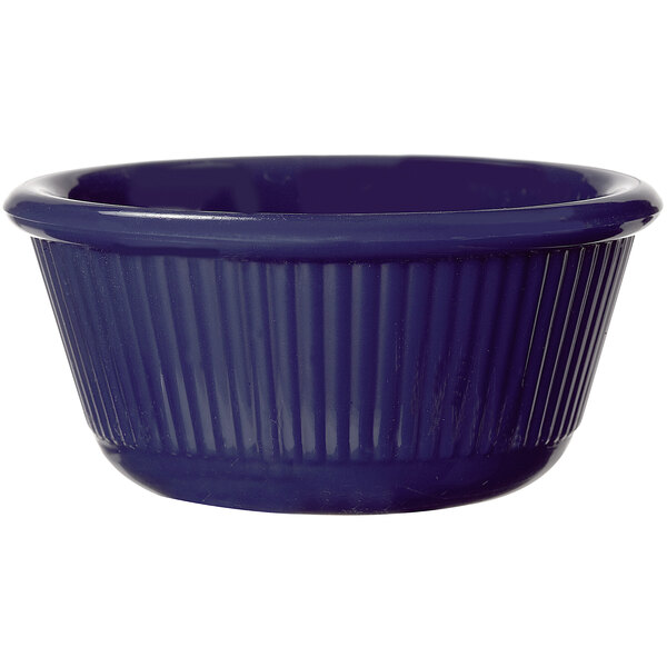 A cobalt blue fluted ramekin.