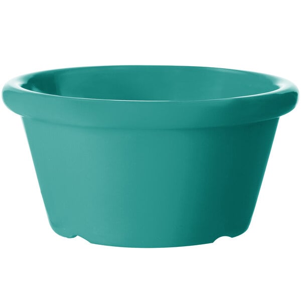 A teal smooth melamine ramekin.