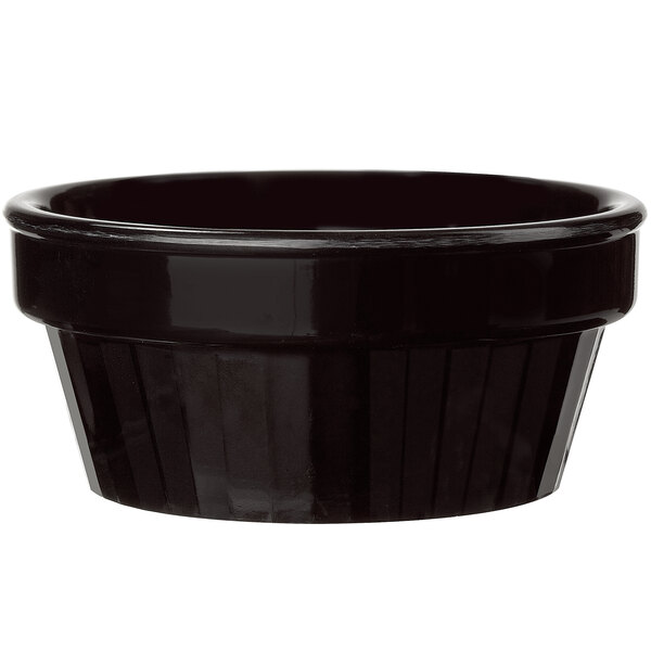 A black fluted melamine ramekin.