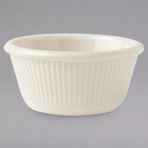 A white fluted ramekin.