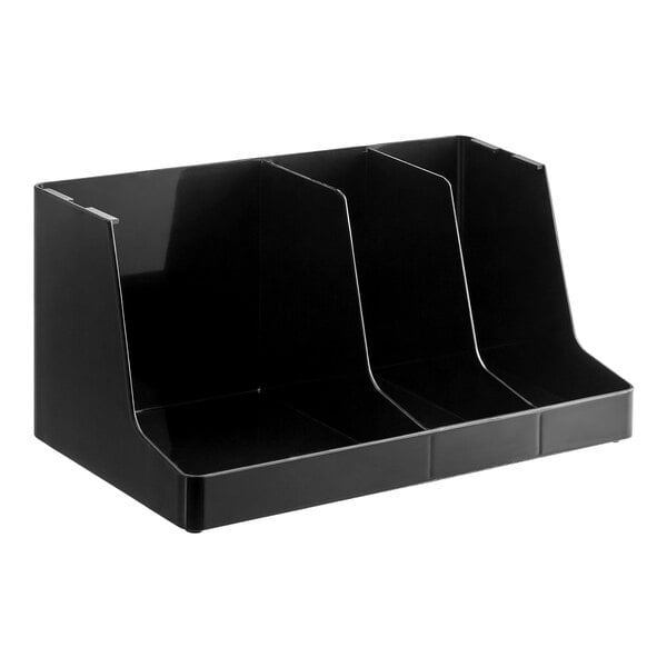 A black three-section countertop organizer for cups, lids, and napkins.