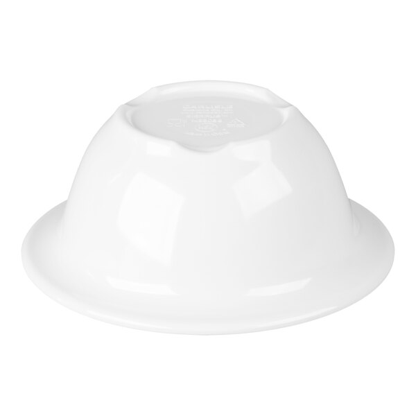 A white rimmed melamine nappie bowl turned upside down.