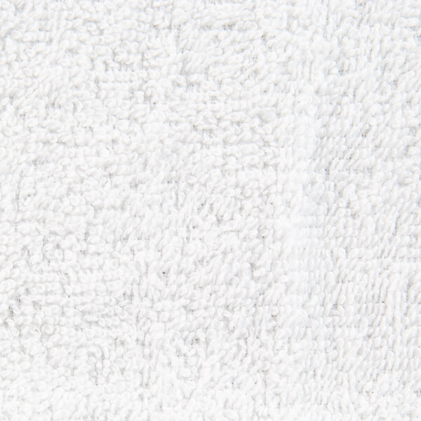 A close-up of a white Oxford Belleeza washcloth.