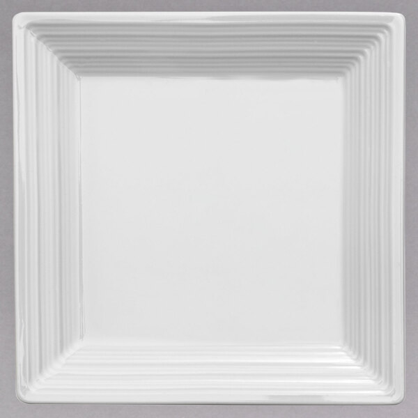 A white square Oneida porcelain plate with a square white border.