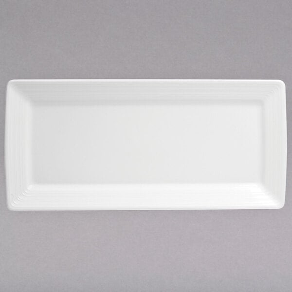 A white rectangular Oneida Botticelli porcelain platter on a gray background.