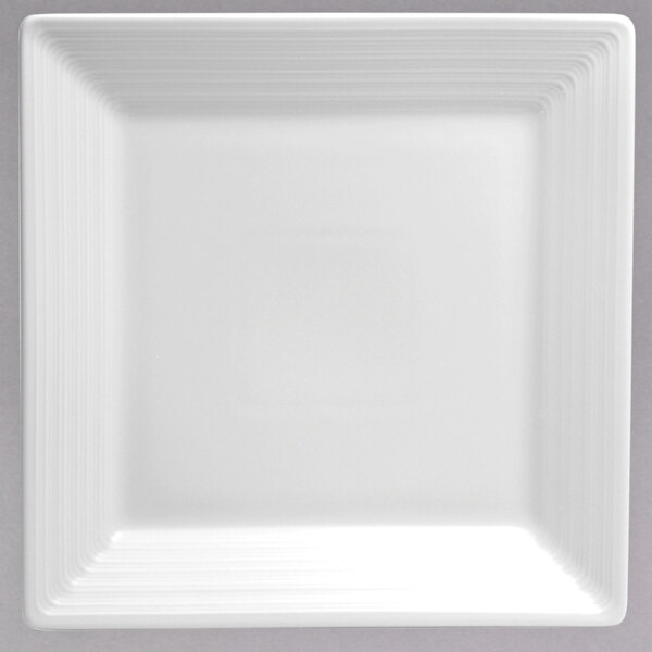 A white square Oneida porcelain plate with a white rim.