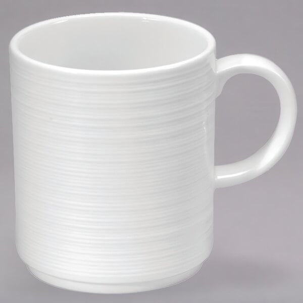 A close up of the handle of a Sant' Andrea Botticelli porcelain mug.