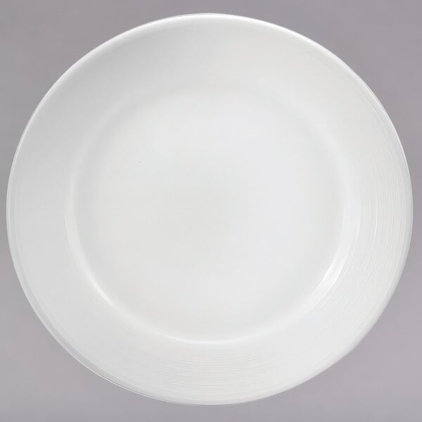 A Sant' Andrea Botticelli bright white porcelain plate with a white background.